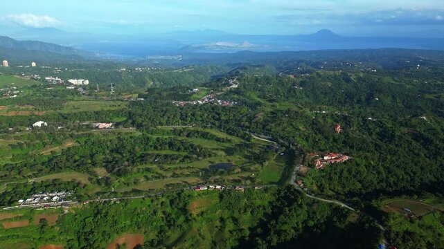 Wide angle view of Batulao views capturing the Don Bosco Chape, tiny houses and the famous taal Volcano at Batulao Nasugbo Batangas Philippines