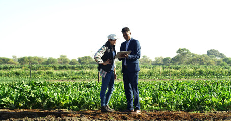 Tablet, conversation and people at farm for sustainability teamwork, agreement or collaboration. Discussion, tech and businessman with woman, inspection and quality assurance for support or trust © peopleimages.com