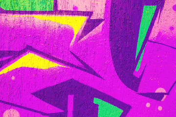 Bright purple, yellow, green graffiti on textured urban wall. 90s, Y2K style, street culture, paint...