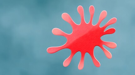 Fototapeta premium Bright red splash design on blue background creating a bold visual effect