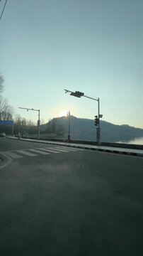 driving on the shore of the lake