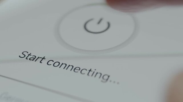 User taps the button to initiate the connection process to a remote server, VPN application used to secure internet traffic and mask IP addresses