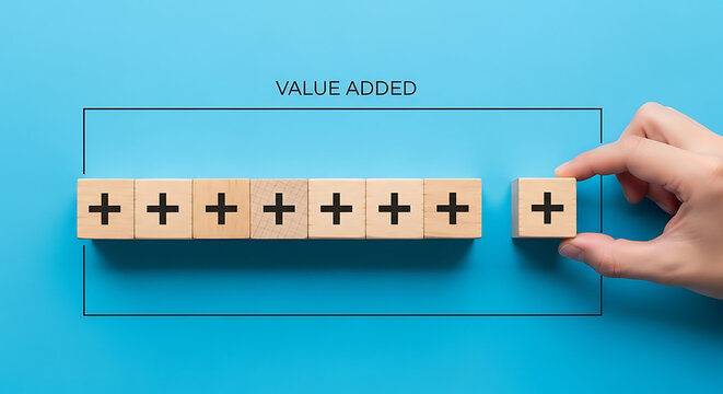 A hand adding value to a series of wooden blocks with plus signs on a blue background