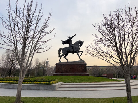 Side view of Amir Temur monument in Tashkent, Uzbekistan. Amir Temur Square, historic landmark and city park.