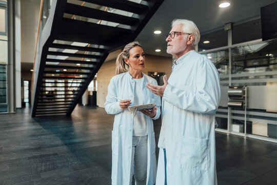 Doctors discussing in a modern clinic setting