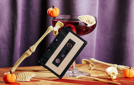 Vintage cassette and skeleton decoration with cocktail for Halloween