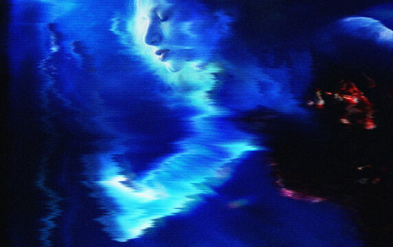 Abstract blue holographic woman in virtual reality underwater scene