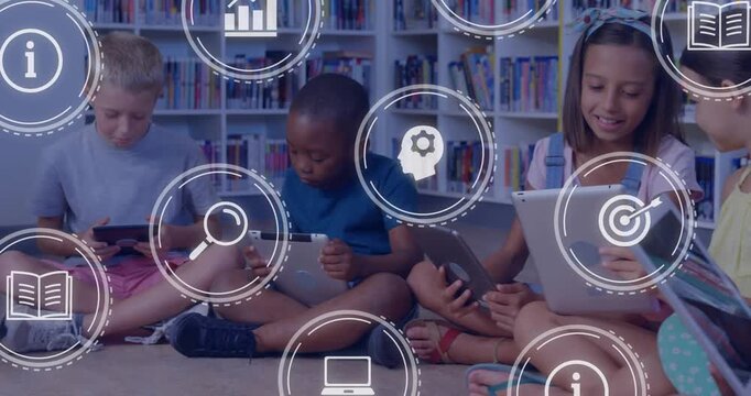 Six students sitting in library reading area, tapping tablets and spawning icons for group study