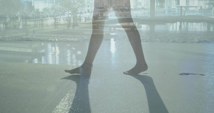Woman walking barefoot along wet sand, anklet flashing, city overlays alternating, music driving