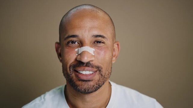 Beauty portrait of middle-aged hispanic black handsome man on colored background, concepts about beauty treatment, skincare and cosmetics for men