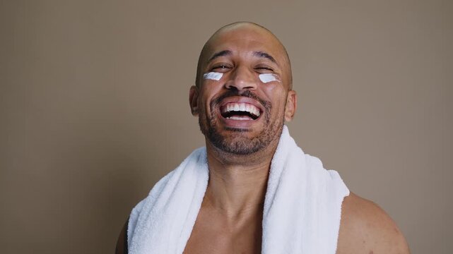Beauty portrait of middle-aged hispanic black handsome man on colored background, concepts about beauty treatment, skincare and cosmetics for men	