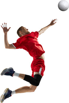 Male volleyball player jumping for spike with ball on transparent background. Concept of professional indoor sport action, powerful attack movement and athletic competition energy.