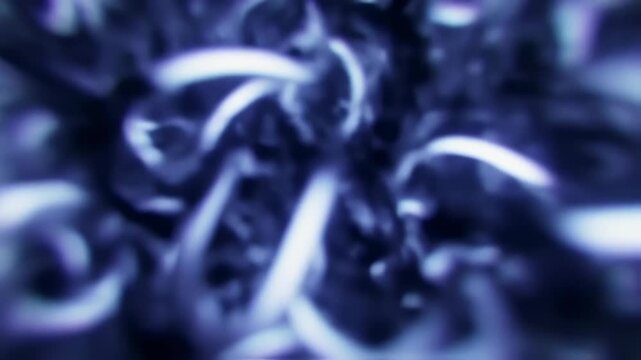 Abstract blue swirling patterns with glowing highlights.