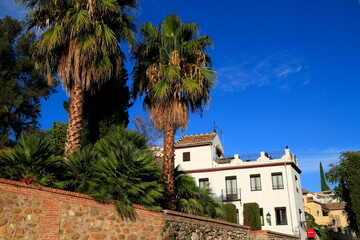 Fototapeta premium Whitewashed Historic Church With Tiled Roofs