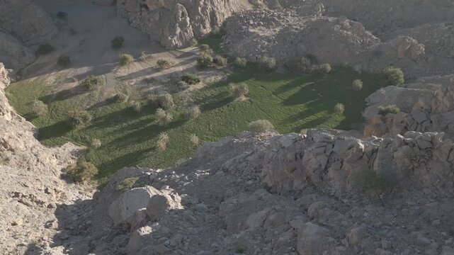 Aerial Drone 4k video of hidden oasis nested in Jebel Jais Ras Al Khaima