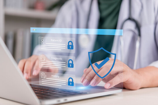 Hand doctor typing laptop clinic protect medical data security privacy shield patient history diagnosis electronic health record cyber compliance.