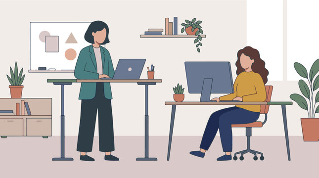 Two women working efficiently in a modern, minimalist office space