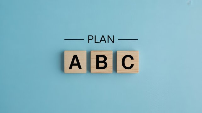Business strategy concept with Plan A B C on wooden blocks over blue background