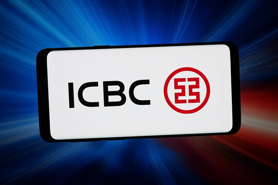 Stuttgart, Germany - 02-25-2026: In this photo illustration, the logo of Industrial and Commercial Bank of China ICBC is displayed on a smartphone in front of abstract background on computer screen.