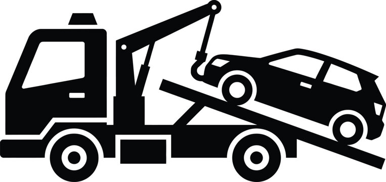 Tow truck transporting damaged car on flatbed for repair or salvage vehicle recovery service