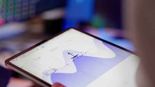 Tablet stylus weekly growth chart analytics. Digital planner interface Tuesday Wednesday labels upward arrow trend performance monitoring business statistics data visualization