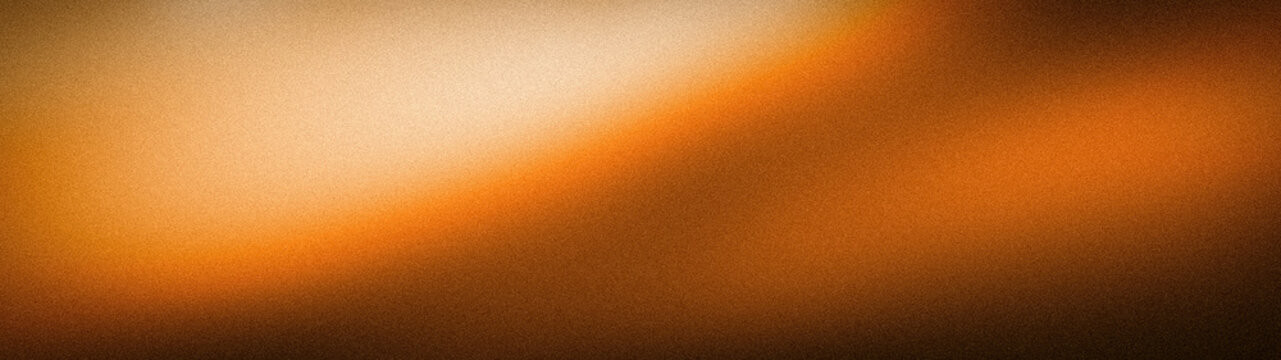 Luxury abstract grainy gradient background in warm orange bronze and dark tones