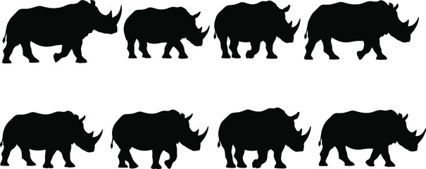 Rhinoceros silhouette collection featuring diverse poses of wild African rhinos walking and standing isolated on a clean white background vector illustration set © Jesmin