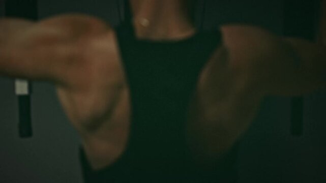 Cinematic Close-up of Muscular Back During Lat Pulldown Exercise