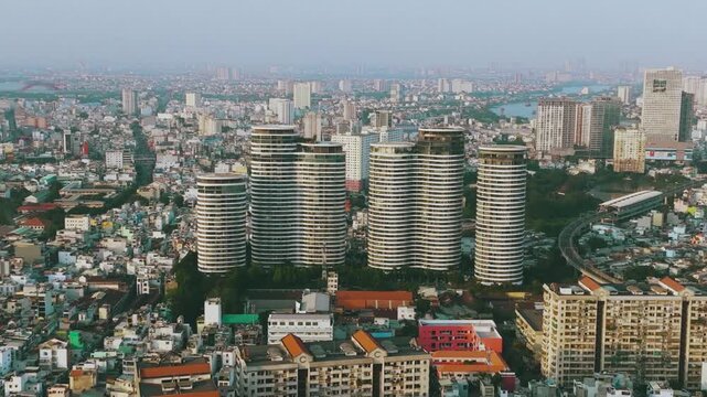 4K Aerial View of City Garden Apartment Towers Ho Chi Minh City
he unique cylindrical architecture of the City Garden residential complex in Binh Thanh District, Ho Chi Minh City. 