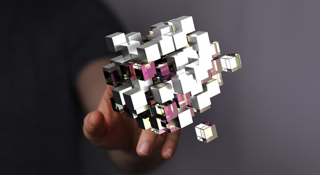 Abstract image of a hand interacting with a 3D cube structure. Represents concepts of innovation, technology, and connec