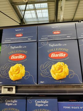 Saujon, France - January 24, 2026: Intermarche. Barilla Tagliatelle pasta boxes displayed on a supermarket shelf, featuring blue packaging and yellow pasta design