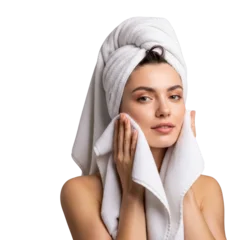 Woman with towel drying face © IMPic