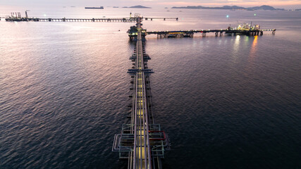 Obraz premium Aerial view industrial oil and gas pipeline system, Energy industry pipeline structure oil and gas refinery, Industrial pipeline system petrochemical plant refinery, Petrochemical pipeline network.