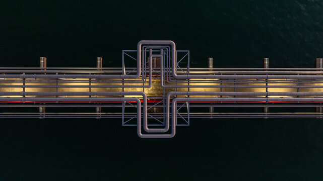 Aerial view industrial oil and gas pipeline system, Energy industry pipeline structure oil and gas refinery, Industrial pipeline system petrochemical plant refinery, Petrochemical pipeline network.