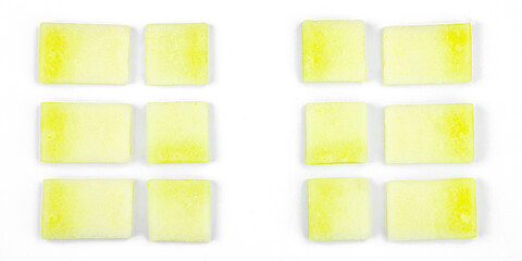 Geometric pattern of fresh melon pieces cut into squares, circles, triangles. Abstract food design