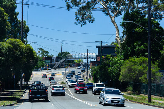 Traffic on city street seen through car window on the road