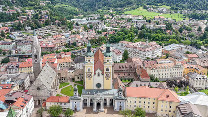 Obraz premium aerial drone view, Brixen, Bressanone city. View on the grand place with the cathedral and St. Michael church. sunny summer view. Photo for tourist brochure, publicity. City in south Tyrol.