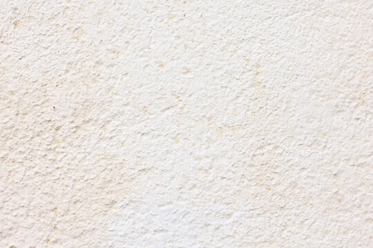 Textured background in soft beige and white colors with detailed surface