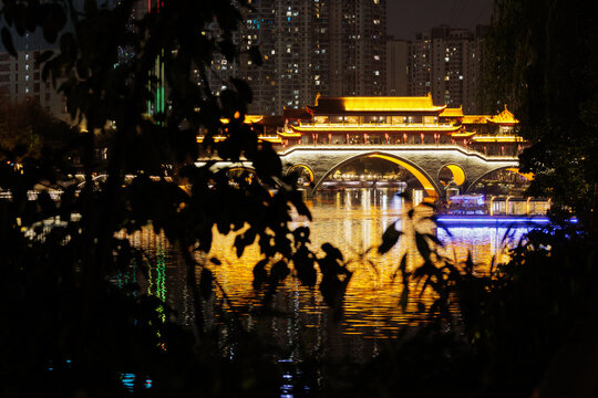 Anshun bridge over jinjiang river at night in chengdu, china