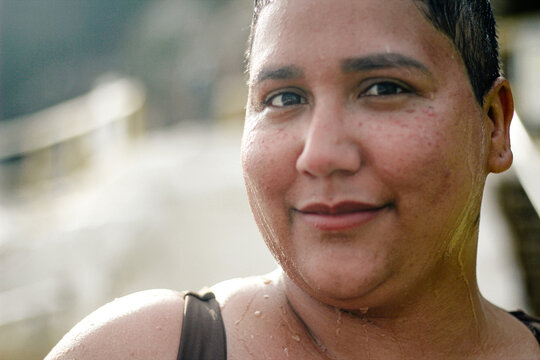 Close up of French Islander woman in the tidal pool