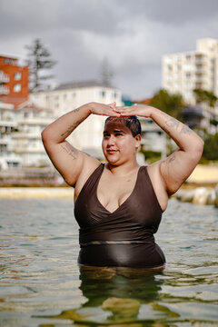 French Islander woman portrait in ocean tidal pool