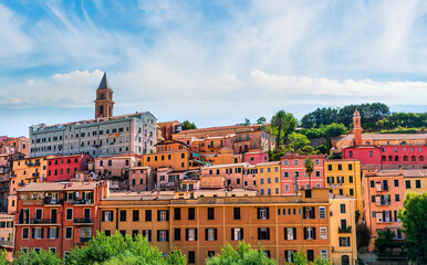 beautiful panoramic landscape of european colorful town in old vintage style with beautiful towers and facades in touristic summer season. Urban view of italian city during summer day on evening.