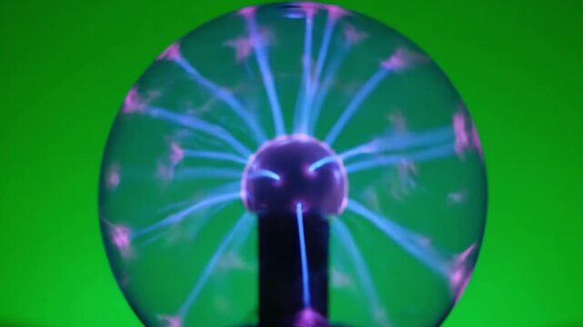 Plasma Globe with Electric Arcs on Green Background