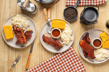 Smoked barbecue ribs with bbq sauce. Summertime cookout barbque food