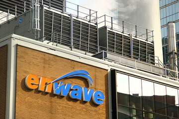 Obraz premium Toronto, Canada - February 15, 2026: Enwave building signage with industrial rooftop in Toronto’s downtown district