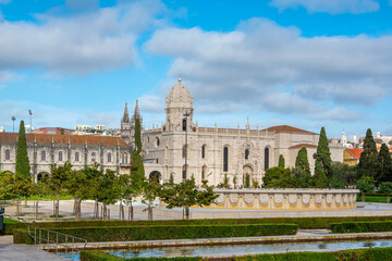 Fototapeta premium Jeronimos Monastery and Garden Fountain in Belem, Lisbon, Portugal