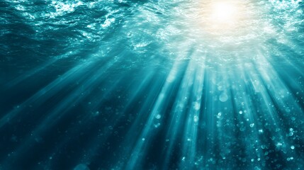Sunlight's Embrace: Glimpses beneath the ocean surface, where rays of sunlight dance through the crystal-clear water, illuminating the depths. A serene view of the underwater realm.