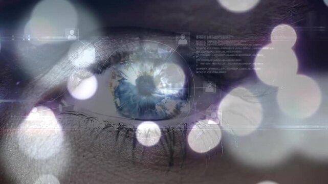 Animation of eye and light spots over data processing on black background
