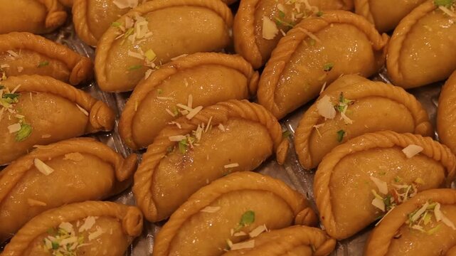 Gujhiya indian holi dessert assorted on beautiful plating 