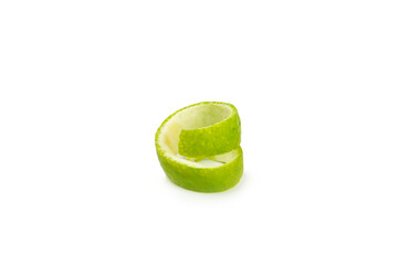 Fresh lime zest isolated on white background. Lime zest or peel close-up. Grated citrus peel. Lime...